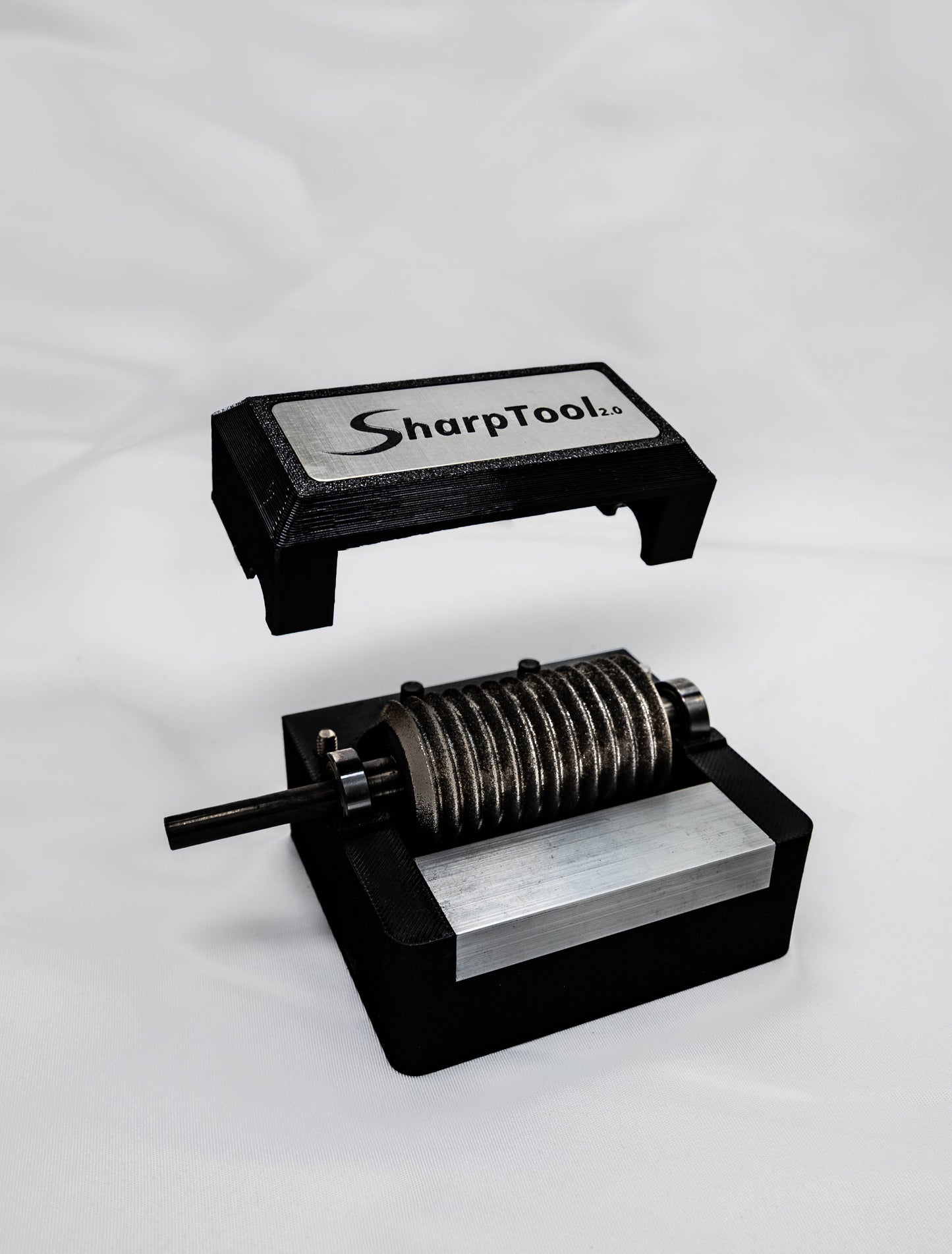 CBN grinding insert with SharpTool 2.0 housing and replacement roller for tool sharpening